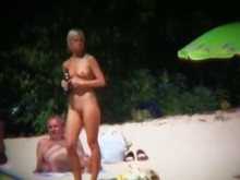 Fotos nudistas de voyeur en la playa de mujeres sexys y bronceadas
