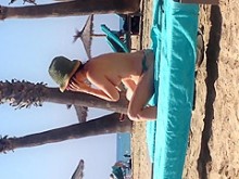 voyeur mira la playa