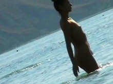 Un fascinante video voyeur de playa nudista